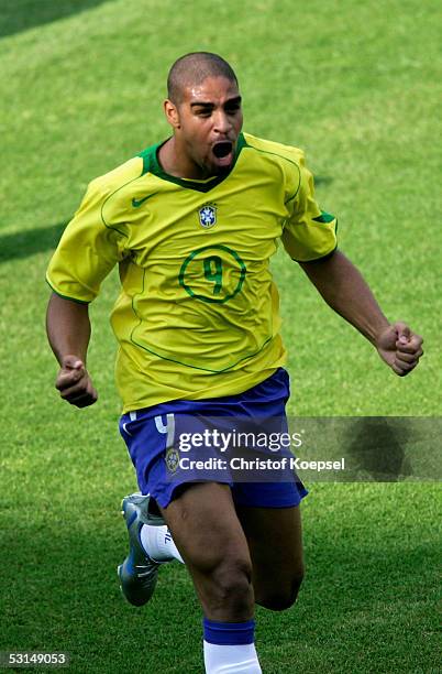 Adriano of Barzil celebrates after scoring Brazil's third goall during the Semi Final match between Germany and Brazil in the FIFA Confederations Cup...
