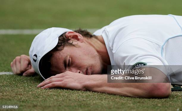 Andrew Murray of Great Britain recieves treatment during his match against David Nalbandian of Argentina during the sixth day of the Wimbledon Lawn...
