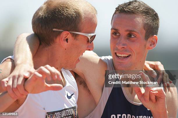 Christopher Lukezic hugs Alan Webb after Webb won the Men 1500 meter Run at the 2005 USA Outdoor Track and Field Championships on June 25, 2005 at...