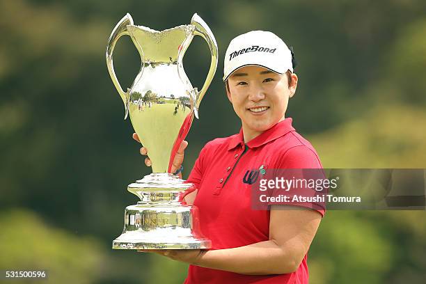 Jiyai Shin of South Korea poses with the trophy after winning the Hoken-no-Madoguchi Ladies at the Fukuoka Country Club Ishino Course on May 15, 2016...