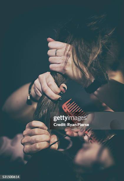 Models hair is prepared backstage during the Maticevski show during Mercedes-Benz Fashion Week Australia at Barangaroo on May 15, 2016 in Sydney, New...