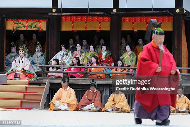 The 'SAoi-dai' queen, principle figure of festival wearing a 12-layered ceremonial kimono of Heian Period court ladies called Junihitoe, sits on...