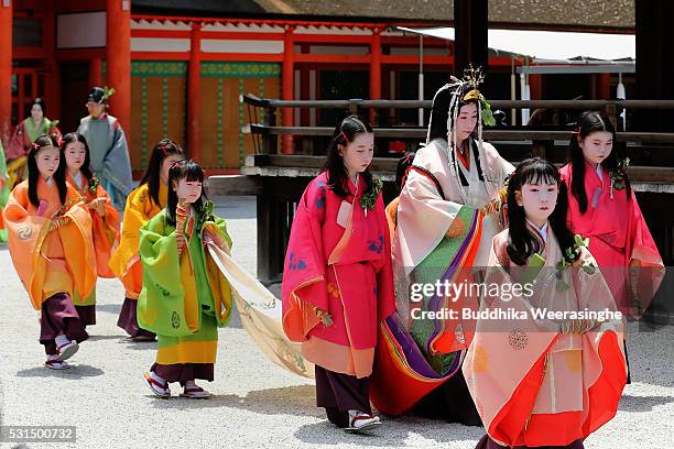 The 'SAoi-dai' queen, principle figure of festival wearing a 12-layered ceremonial kimono of Heian Period court ladies called Junihitoe, arrives...