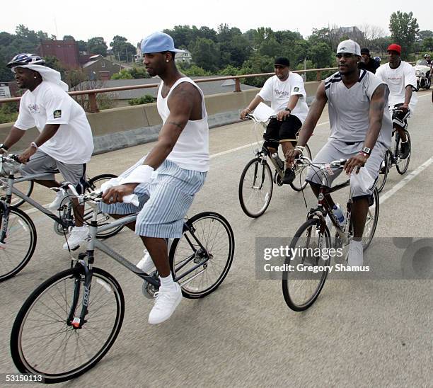 LeBron James of the Cleveland Cavaliers , Tracy McGrady of the Houston Rockets and Dwyane Wade of the Miami Heat participate in the Lebron James...