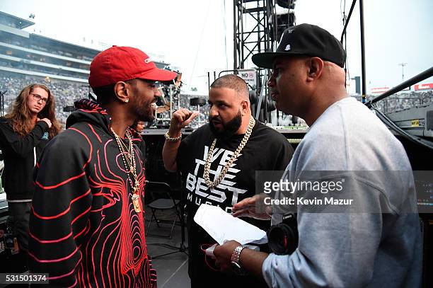 Recording artists Big Sean and DJ Khaled talk backstage during "The Formation World Tour" at the Rose Bowl on May 14, 2016 in Pasadena, California.
