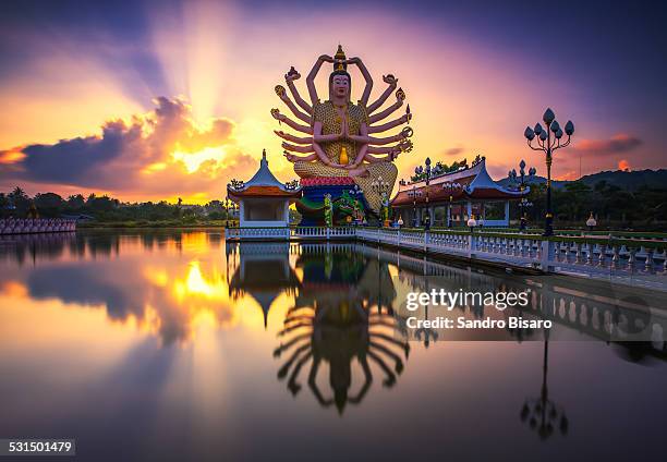 wat plai laem temple buddha statue at sunrise - wat plai laem temple stock pictures, royalty-free photos & images
