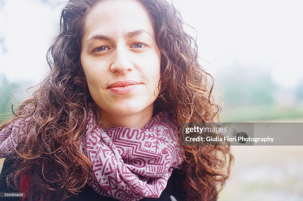 Portrait of woman looking at camera