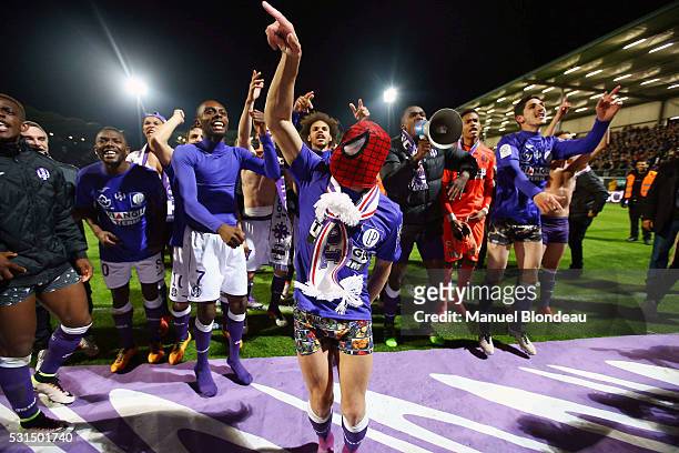Adrien Regattin of Toulouse celebrates after the football french Ligue 1 match between Angers SCO and Toulouse FC on May 14, 2016 in Angers, France.