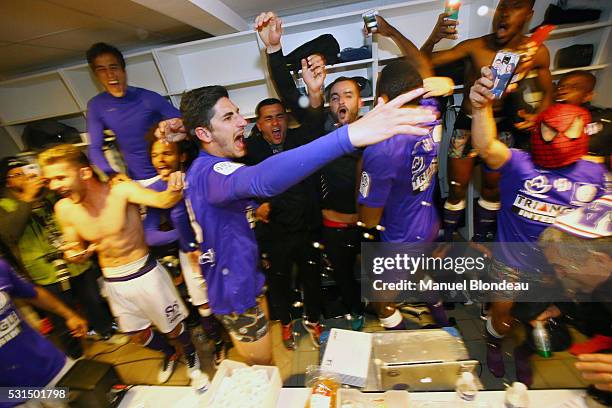 Yan Bodiger of Toulouse celebrates with his teammates in the cloakroom after the football french Ligue 1 match between Angers SCO and Toulouse FC on...