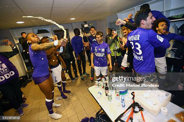 Jean Armel Kana Biyik and Wissam Ben Yedder of Toulouse celebrate in the cloakroom after the football french Ligue 1 match between Angers SCO and...