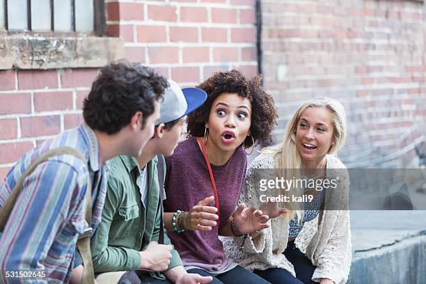 young adults hanging out talking - verhaal stockfoto's en -beelden