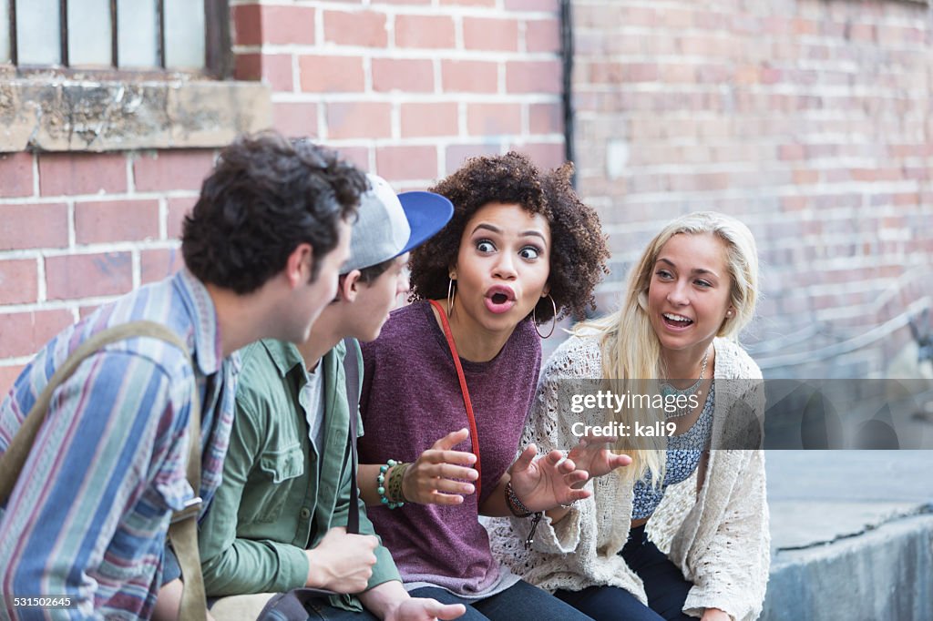 Young adults hanging out talking