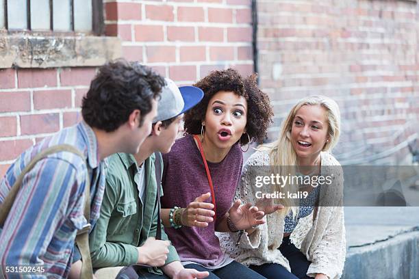 young adults hanging out talking - historia bildbanksfoton och bilder