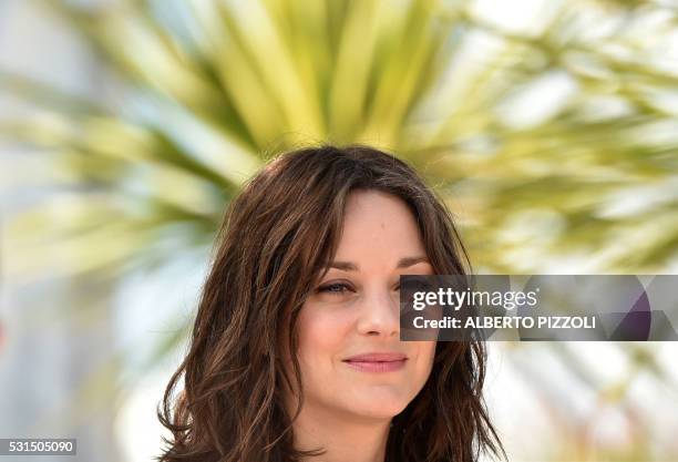 French actress Marion Cotillard poses on May 15, 2016 during a photocall for the film "Mal de Pierres " at the 69th Cannes Film Festival in Cannes,...