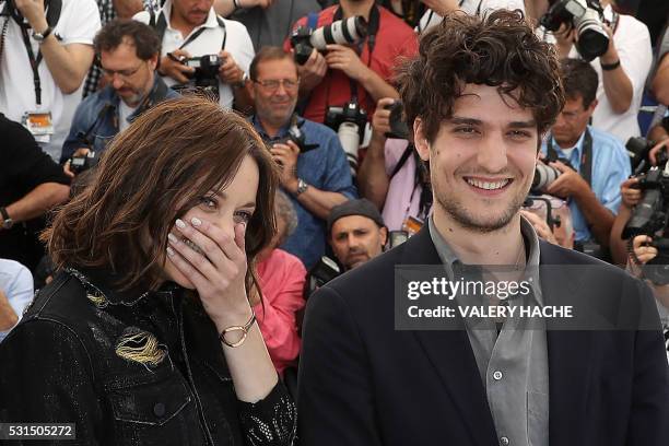 French actress Marion Cotillard and French actor Louis Garrel pose on May 15, 2016 during a photocall for the film "Mal de Pierres " at the 69th...