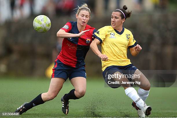 The Matildas captain Lisa De Vanna and Elizabeth O'Reilly of Sydney University challenge for the ball during the NPL 1 NSW Womens Round 6 match...