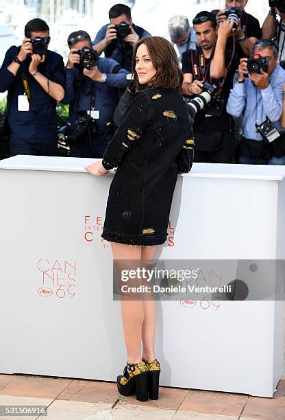 Actress Marion Cotillard attends the "From The Land Of The Moon " photocall during the 69th annual Cannes Film Festival at the Palais des Festivals...