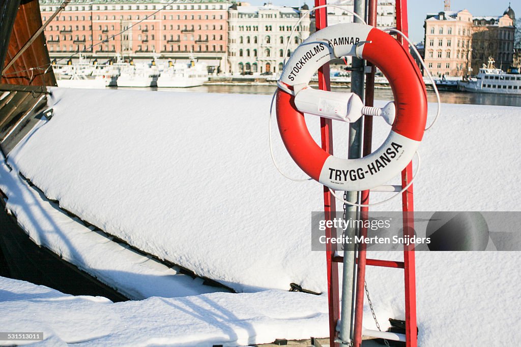 Snow covered ship at Gamla Stan