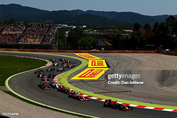 Daniel Ricciardo of Australia driving the Red Bull Racing Red Bull-TAG Heuer RB12 TAG Heuer ahead of Sebastian Vettel of Germany driving the Scuderia...