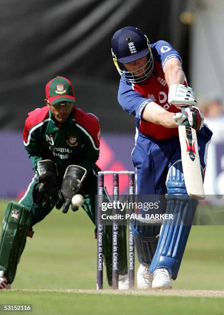 Leeds, UNITED KINGDOM: England's Freddie Flintoff is in to bat but the ball goes straight towards the Bangladeshi wicket keeper during the Triangular...