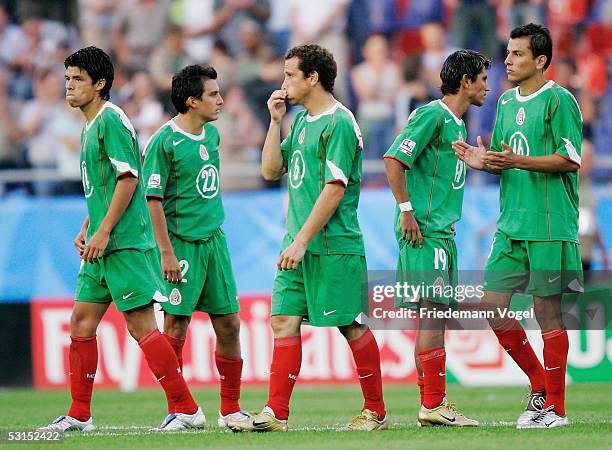 The Mexico squad look dejected after the Semi Final match between Mexico and Argentina for the FIFA Confederations Cup 2005 at the AWDArena on June...