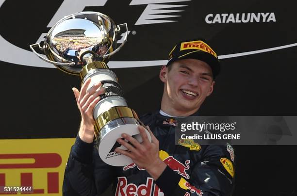 Infiniti Red Bull's Belgian-Dutch driver Max Verstappen celebrates on the podium after the Spanish Formula One Grand Prix on May 15, 2016 at the...