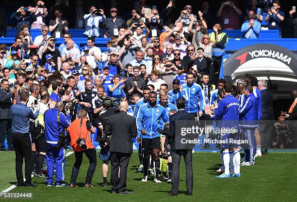 Leicester City players receive the guard of honour from Chelsea players prior to the Barclays Premier League match between Chelsea and Leicester City...