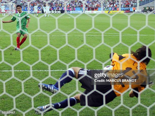 Mexican defender Ricardo Osorio reacts after Argentine goalkeeper German Lux blocked his penalty kick during the 2005 FIFA Confederations Cup...