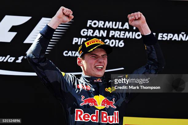 Max Verstappen of Netherlands and Red Bull Racing celebrates his first win on the podium during the Spanish Formula One Grand Prix at Circuit de...