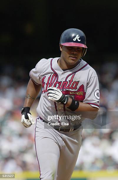 Andruw Jones of the Atlanta Braves runs the bases during game one of the National League Divisional Series against the Houston Astros at Enron Field...