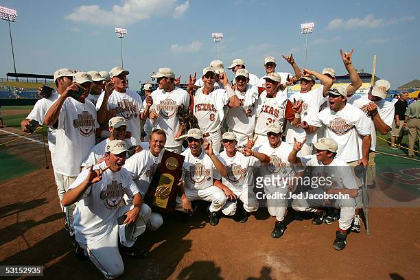 Members of the Texas Longhorns celebrate after defeating the Florida Gators during Game 2 of the championship series of the 59th College World Series...