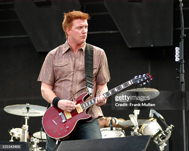 Josh Homme of Queens of the Stone Age during Voodoo Music Experience 2003 - Day Three at City Park in New Orleans, Louisiana, United States.