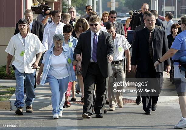 Steven Relford , and other BTK murder victims' family members, arrive at the Sedgwick County Courthouse on the first day of the trial of Dennis L....