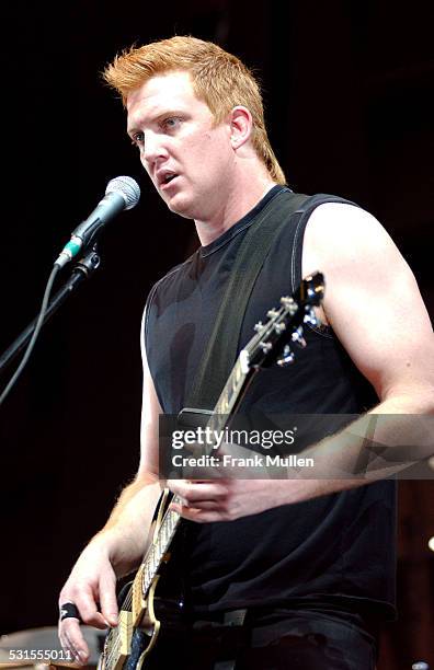 Josh Homme of Queens of the Stone Age during Lollapalooza 2003 - Atlanta at Hi-Fi Buys Amphitheater in Atlanta, Georgia, United States.