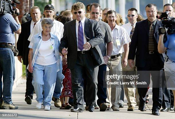 Relatives of BTK murder victims arrive at the Sedgwick County Courthouse on the first day of the trial of Dennis L. Rader, the man accused of being...