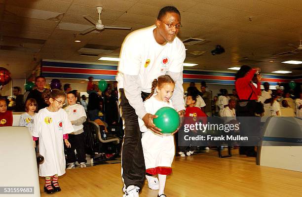 Dominique Wilkins and his daughter, Alexandra at the Dominique Wilkins Foundation and Big Brothers and Big Sisters of America host an "All Star Bowl...