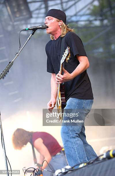 Paul James Phillips and Wesley Reid Scantlin of Puddle of Mudd onstage