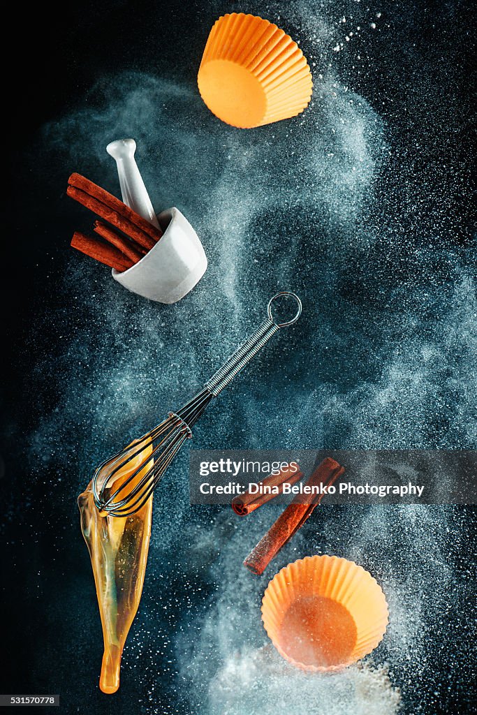 Levitating kitchen utensils in a cloud of flour (for cinnamon cupcakes)