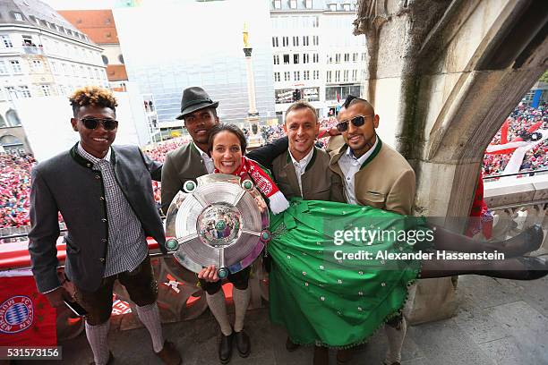 Raffaella Manieri of Bayern Muenchen Womans team celebrates winning the German Championship title with David Alaba, Douglas Costa, Rafinha and Arturo...