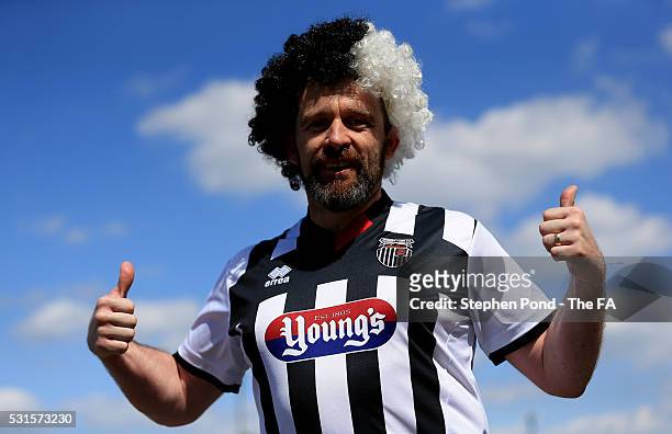 Grimsby Town fan arrives ahead of the Vanarama Football Conference League: Play Off Final match between Forest Green Rovers and Grimsby Town at...