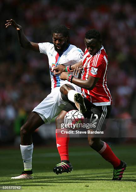 Emmanuel Adebayor of Crystal Palace and Victor Wanyama of Soauthampton compete for the ball during the Barclays Premier League match between...