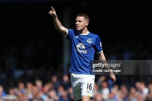 James McCarthy of Everton celebrates scoring his team's first goal during the Barclays Premier League match between Everton and Norwich City at...