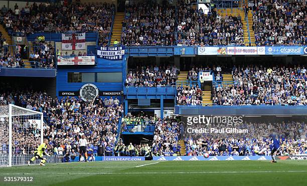 Sesc Fabregas of Chelsea converts the penalty to score his team's first goal during the Barclays Premier League match between Chelsea and Leicester...