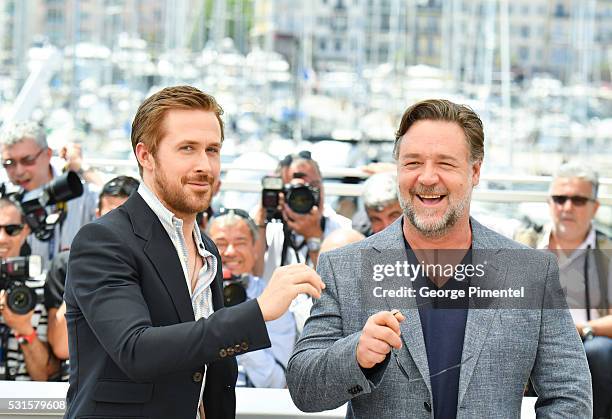 Actor Ryan Gosling and Russell Crowe attend "The Nice Guys " - Photocall at the annual 69th Cannes Film Festival at Palais des Festivals on May 15,...