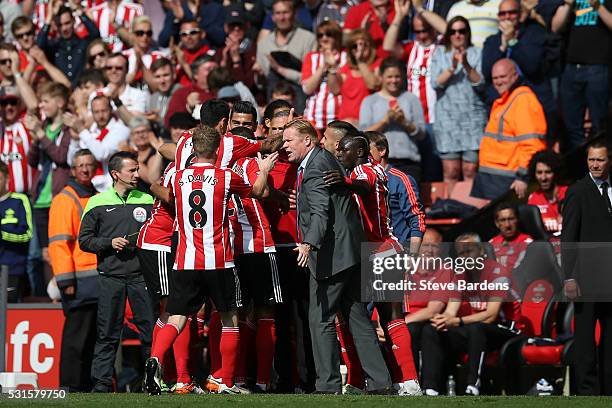 Southampton players and Ronald Koeman manager of Southampton celebrate their team's second goal during the Barclays Premier League match between...