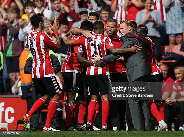 Southampton players and Ronald Koeman manager of Southampton celebrate their team's second goal during the Barclays Premier League match between...