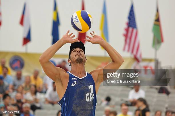 Georgios Kotsilianos of Greece sets the ball during match for third place in the FIVB Antalya Open beach volley tournament, May 15 in the...