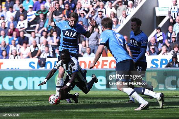 Moussa Sissoko of Newcastle United is challanged by Jan Vertonghen of Tottenham Hotspur resulting in the penalty during the Barclays Premier League...