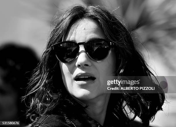 French actress Marion Cotillard poses on May 15, 2016 during a photocall for the film "Mal de Pierres " at the 69th Cannes Film Festival in Cannes,...