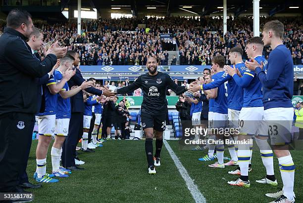 Tim Howard of Everton shakes hands with team mates after his final Everton match during the Barclays Premier League match between Everton and Norwich...